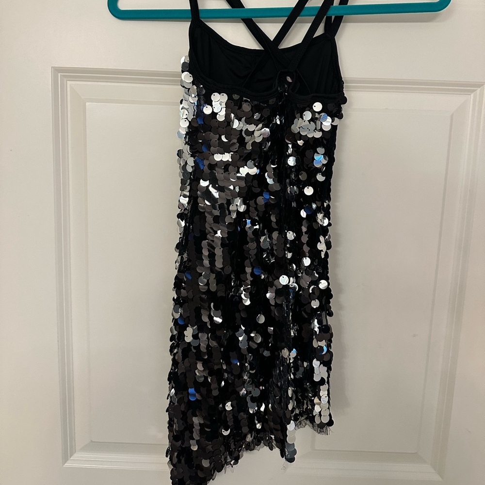 Sequin child dance dress. 
Brand : Revolution